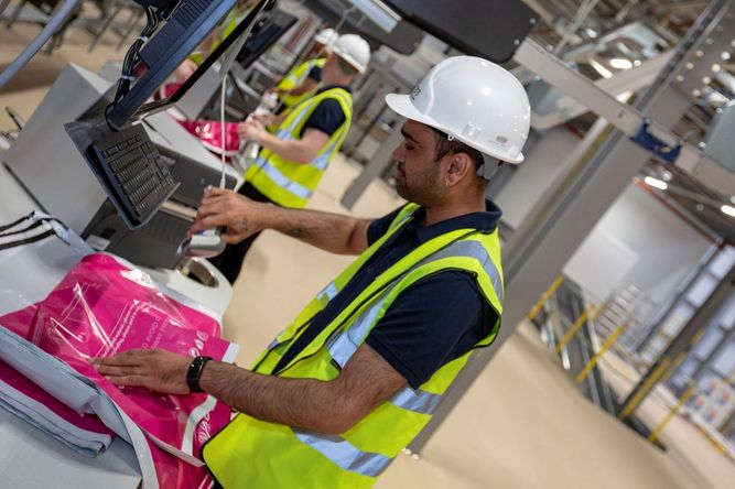 Man working in The Very Group warehouse